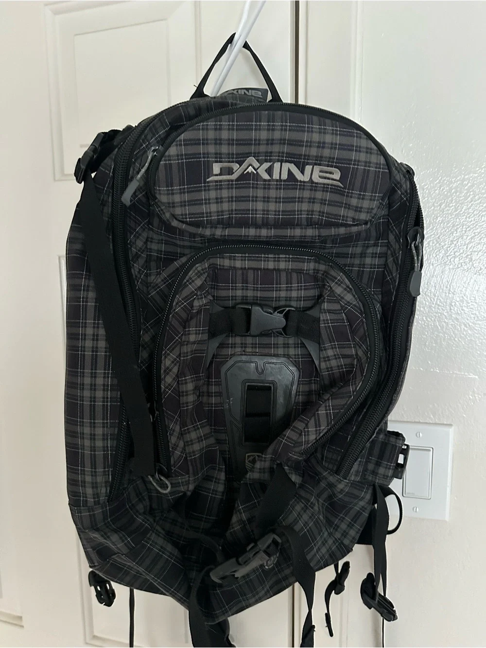 Dakine Black Plaid Men’s Backpack with Gray Accents